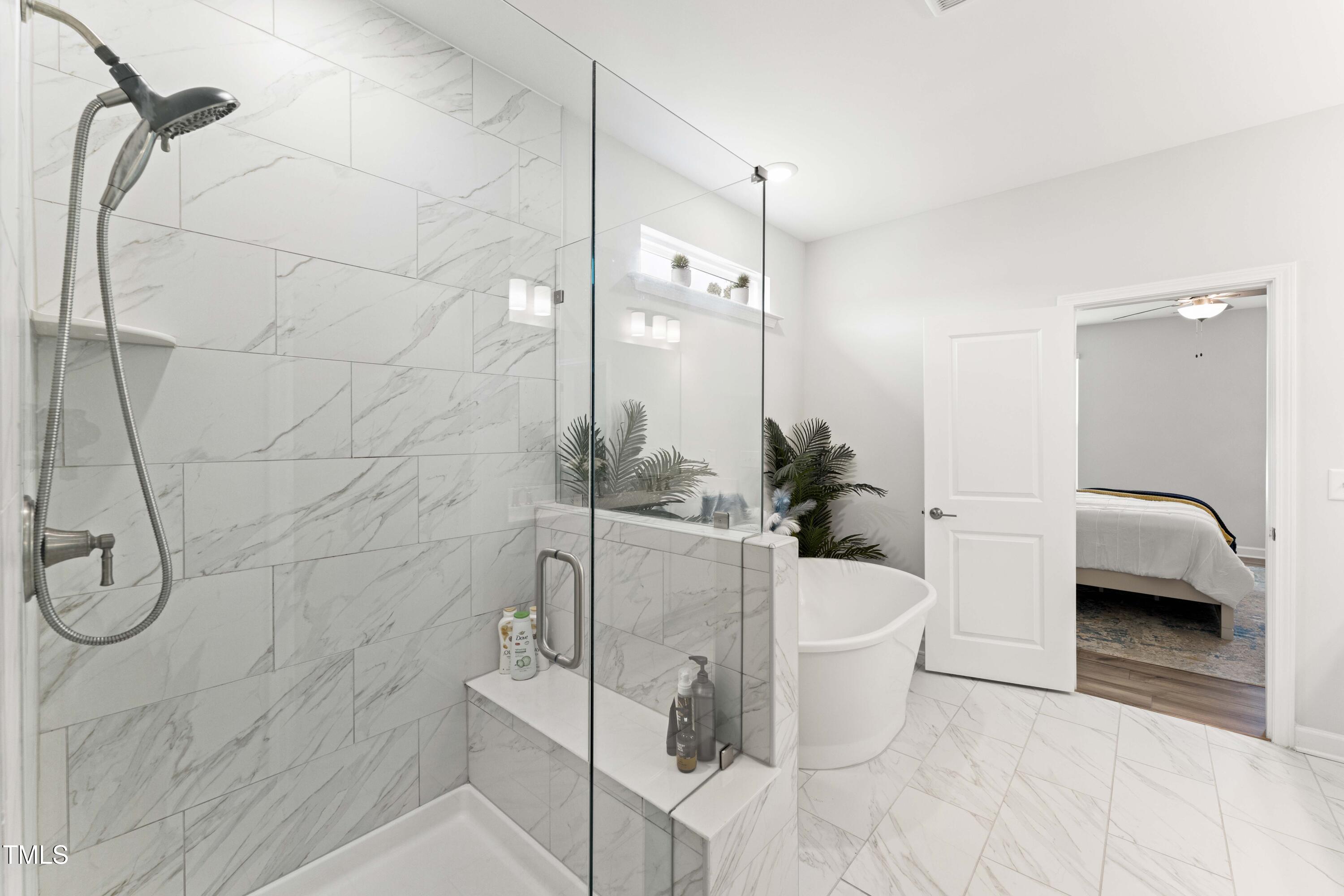 205 Morningside Lane Angier, NC 27501 - Photo 25 of 46 a white bath tub sitting next to a white tub