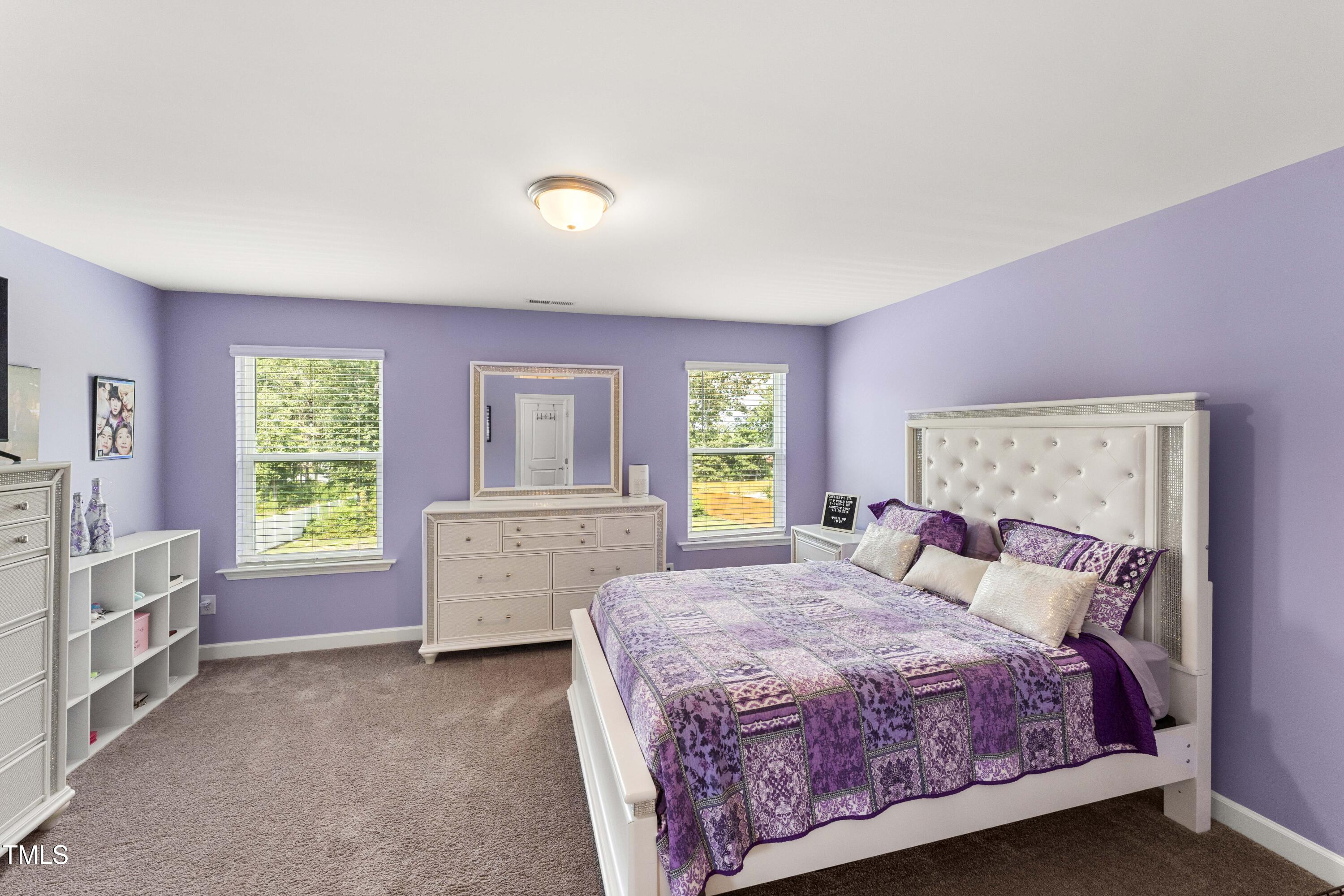 205 Morningside Lane Angier, NC 27501 - Photo 29 of 46 a bed room with a bed and a window