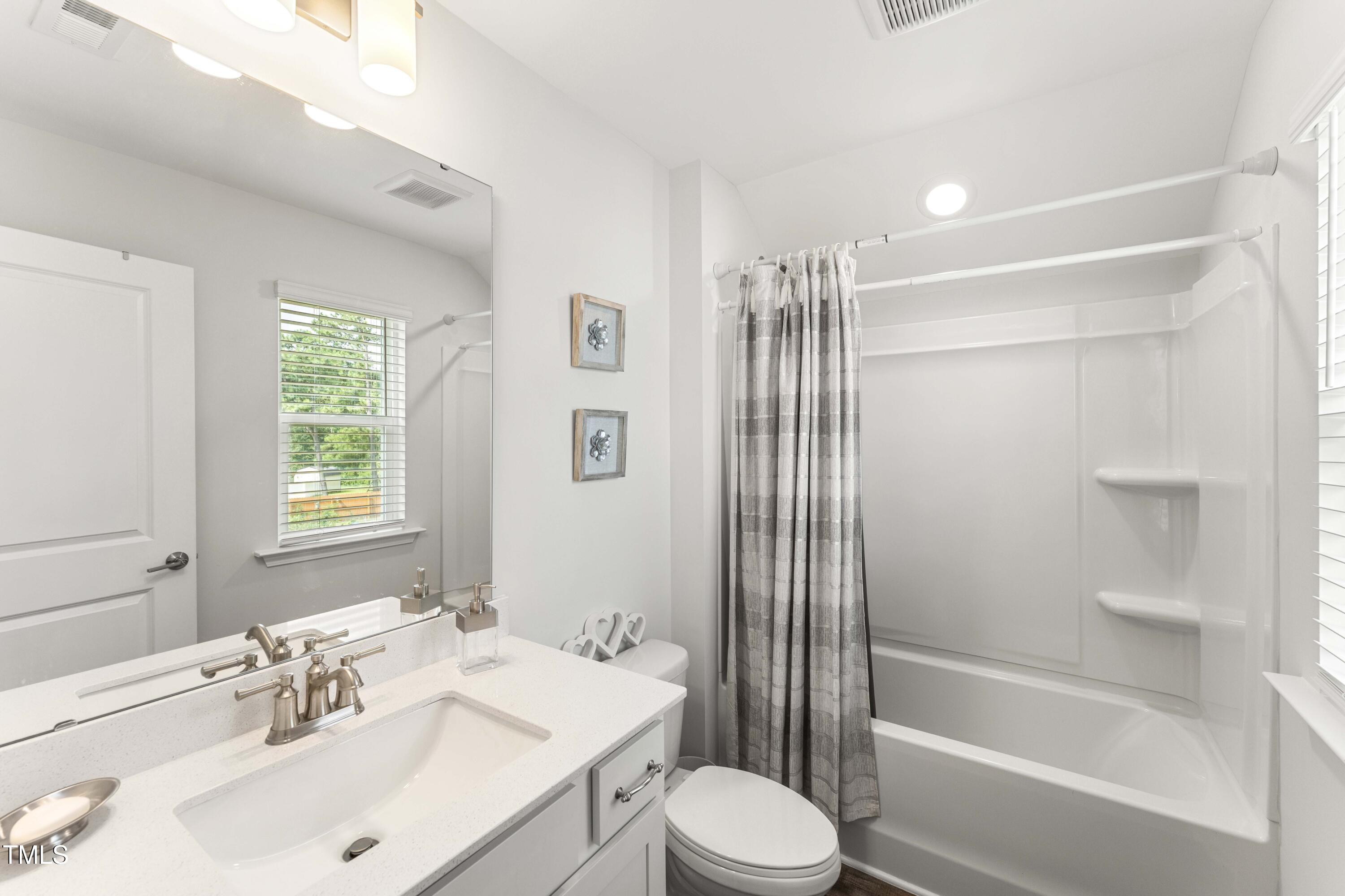 205 Morningside Lane Angier, NC 27501 - Photo 36 of 46 a bathroom with a sink toilet and shower
