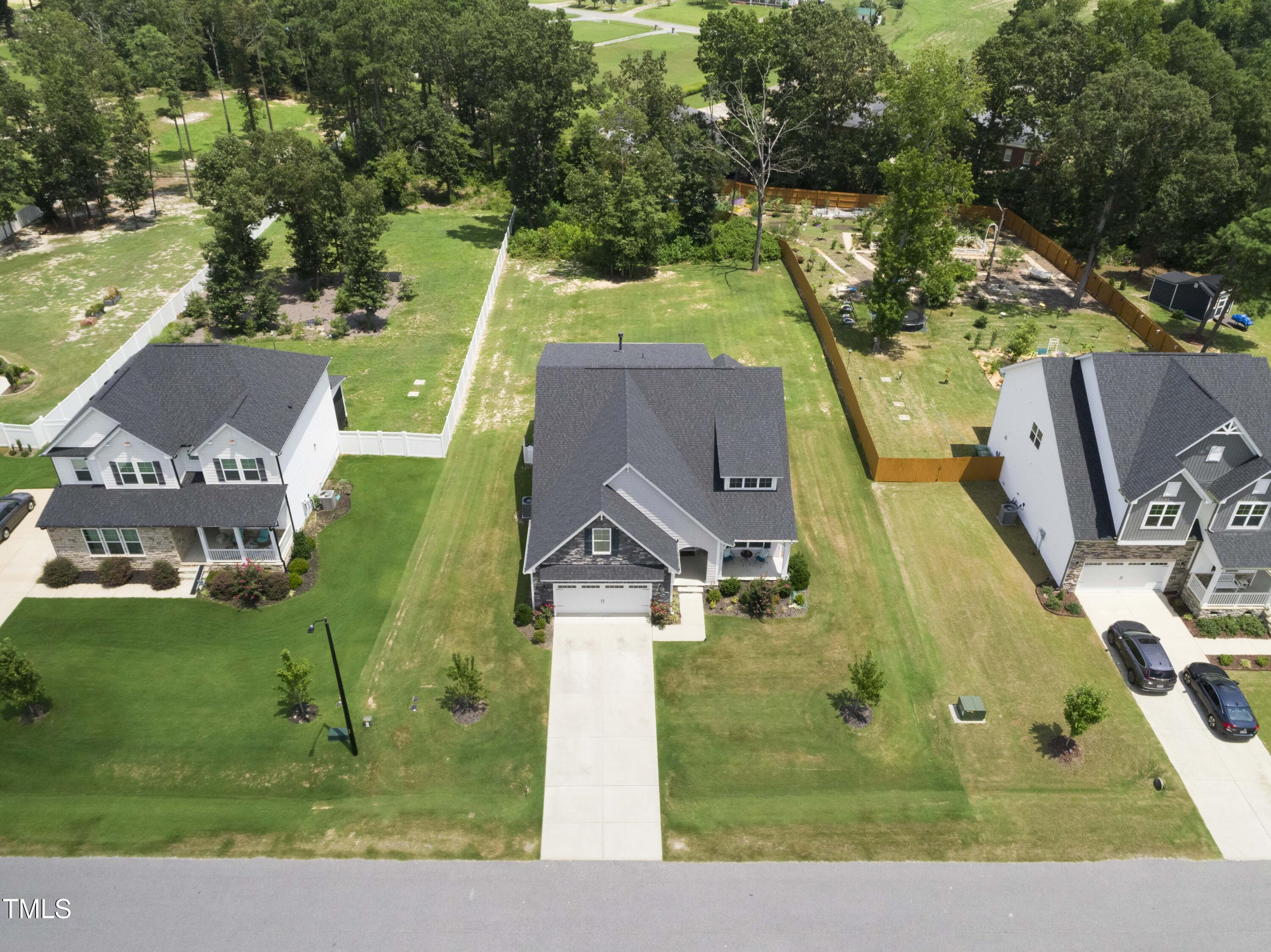 205 Morningside Lane Angier, NC 27501 - Photo 43 of 46 an aerial view of a house with a yard