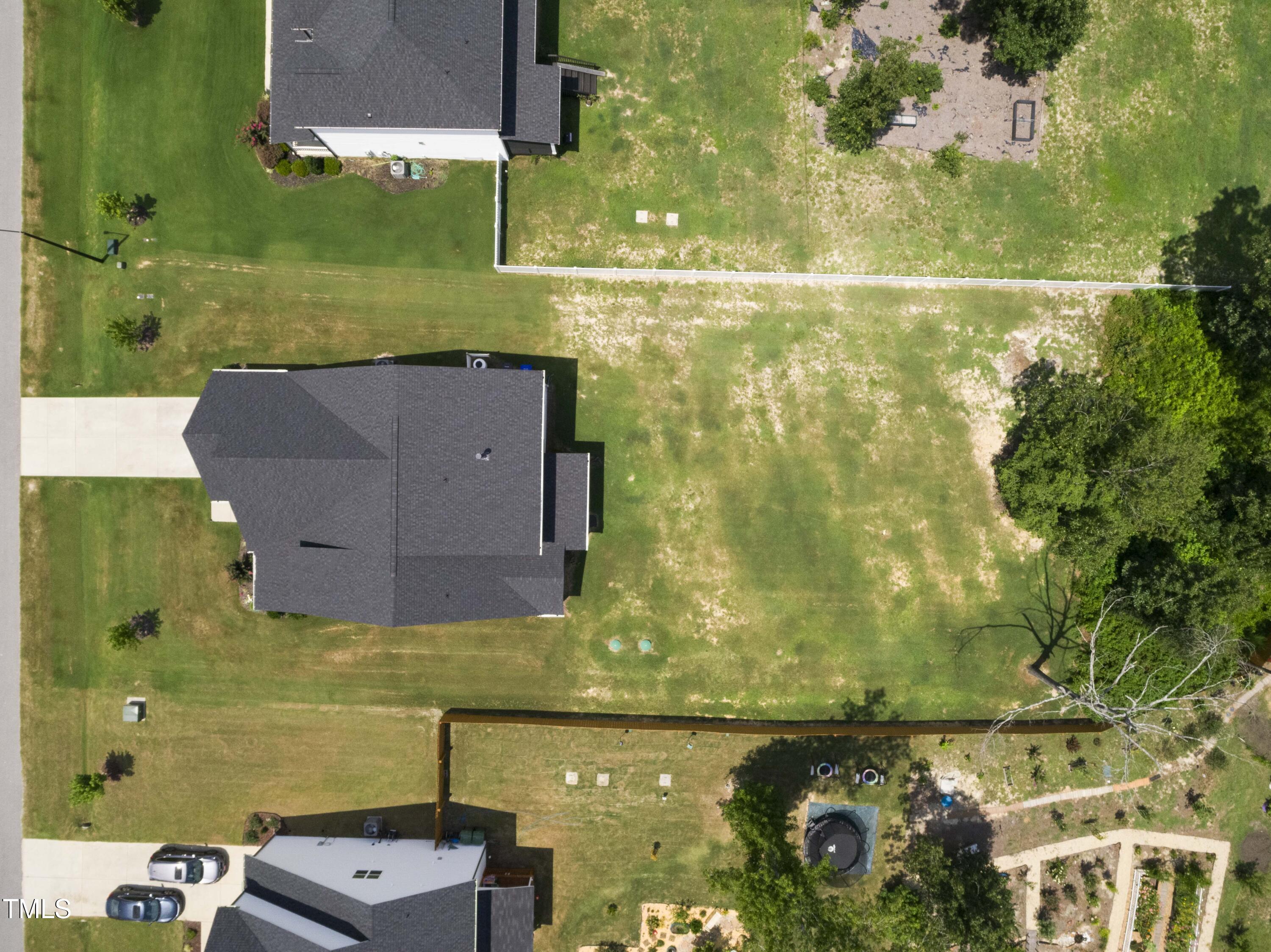 205 Morningside Lane Angier, NC 27501 - Photo 44 of 46 an aerial view of residential houses with outdoor space