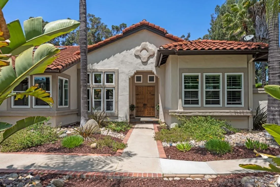 15928 Cumberland Drive Poway, CA 92064 - Photo 2 of 41 a front view of a house with garden