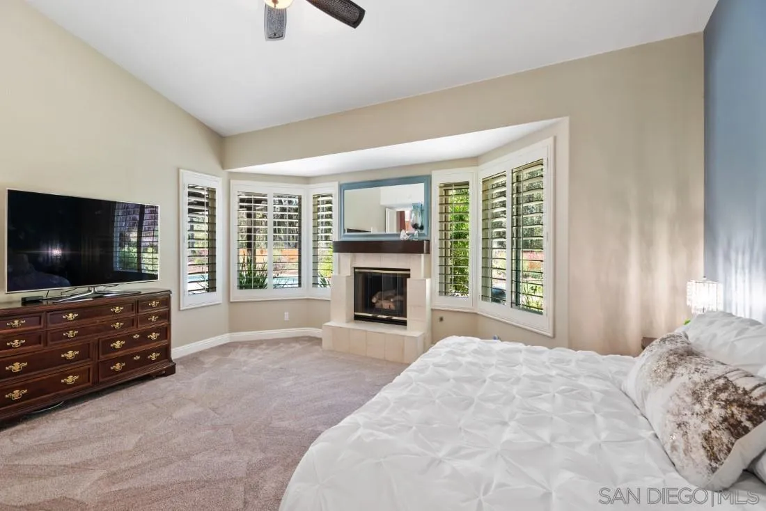 15928 Cumberland Drive Poway, CA 92064 - Photo 21 of 41 a bedroom with a bed and a flat screen tv