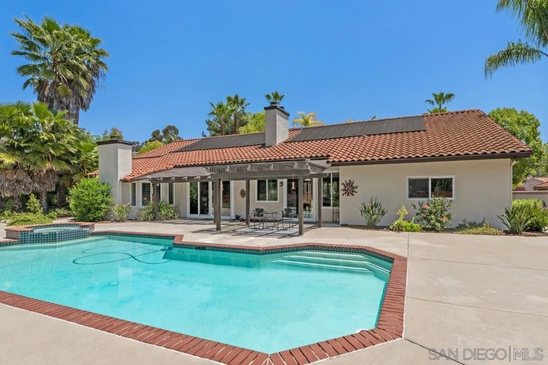 15928 Cumberland Drive Poway, CA 92064 - Photo 34 of 41 a front view of a house with swimming pool having outdoor seating
