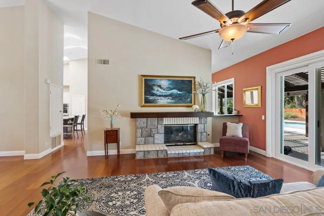 15928 Cumberland Drive Poway, CA 92064 - Photo 9 of 41 a living room with furniture and a fireplace