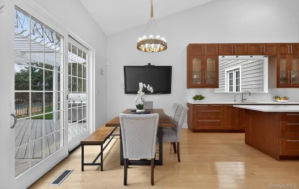 a view of a kitchen with a sink and a microwave