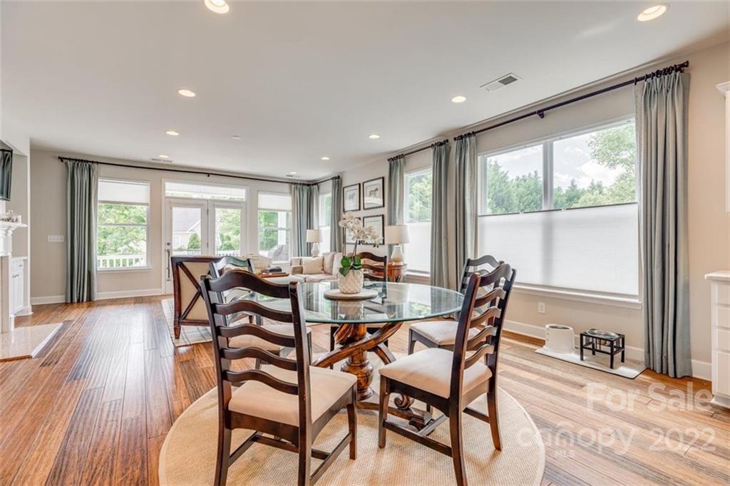 1007 Kaiser Way Fort Mill, SC 29715 - Photo 16 of 48 a view of a dining room with furniture window and wooden floor