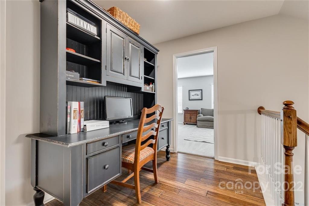 1007 Kaiser Way Fort Mill, SC 29715 - Photo 31 of 48 a view of a workspace with furniture and wooden floor