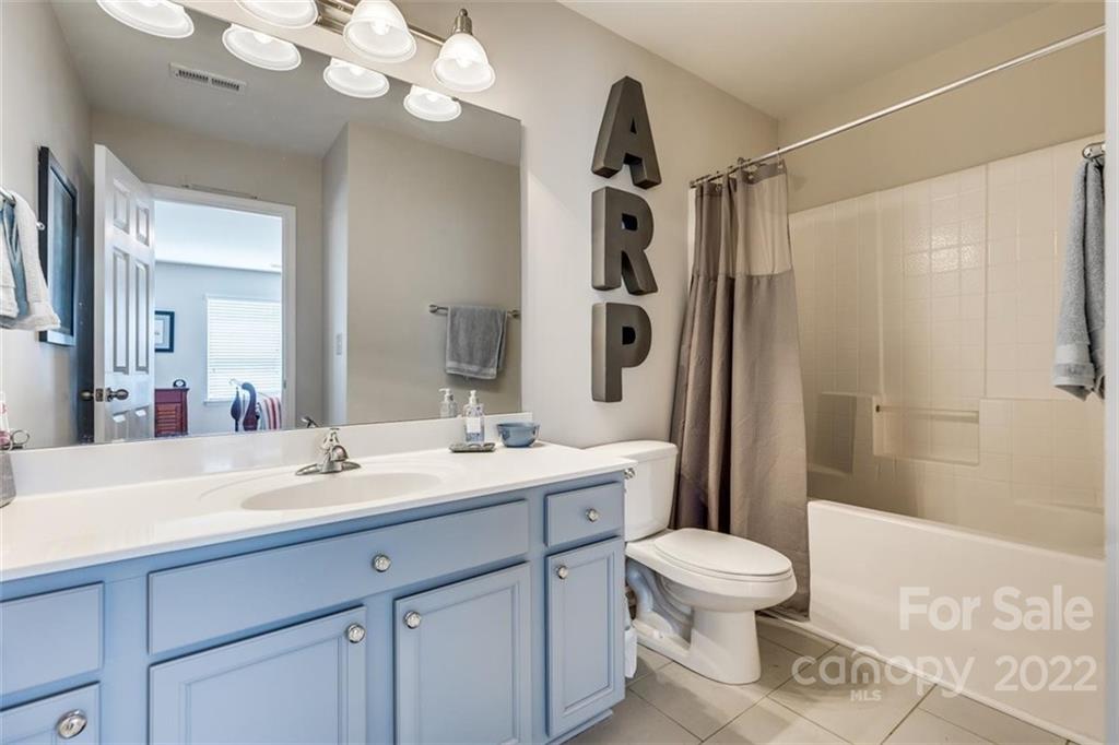 1007 Kaiser Way Fort Mill, SC 29715 - Photo 36 of 48 a bathroom with a sink a toilet and shower