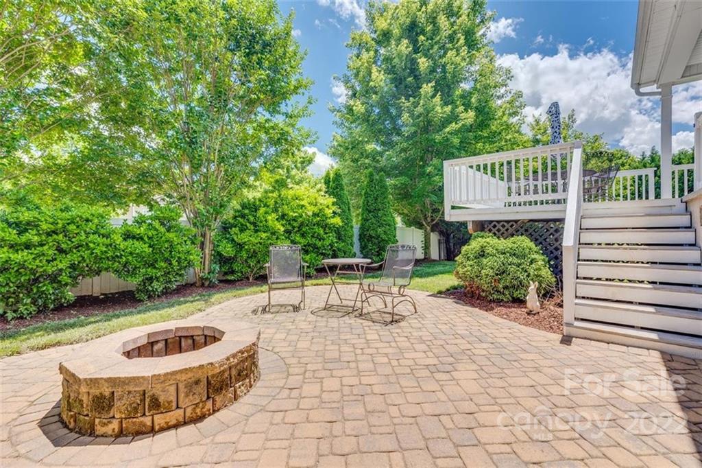 1007 Kaiser Way Fort Mill, SC 29715 - Photo 45 of 48 a view of a chairs and table in backyard