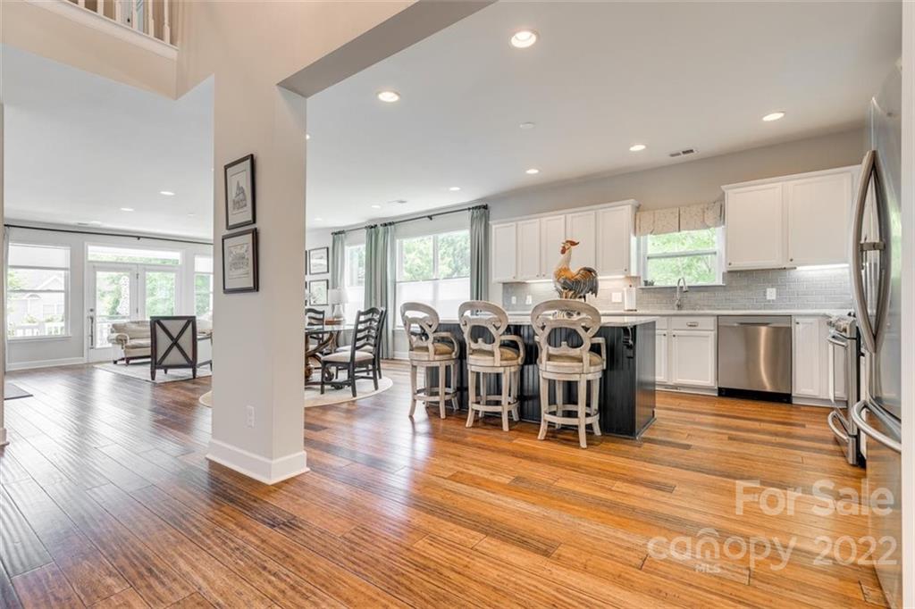 1007 Kaiser Way Fort Mill, SC 29715 - Photo 9 of 48 a view of a dining room kitchen counter top space with stainless steel appliances