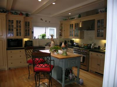 912 Spring Street Santa Rosa, CA 95404 - Photo 6 of 9 a kitchen with a table and chairs in it