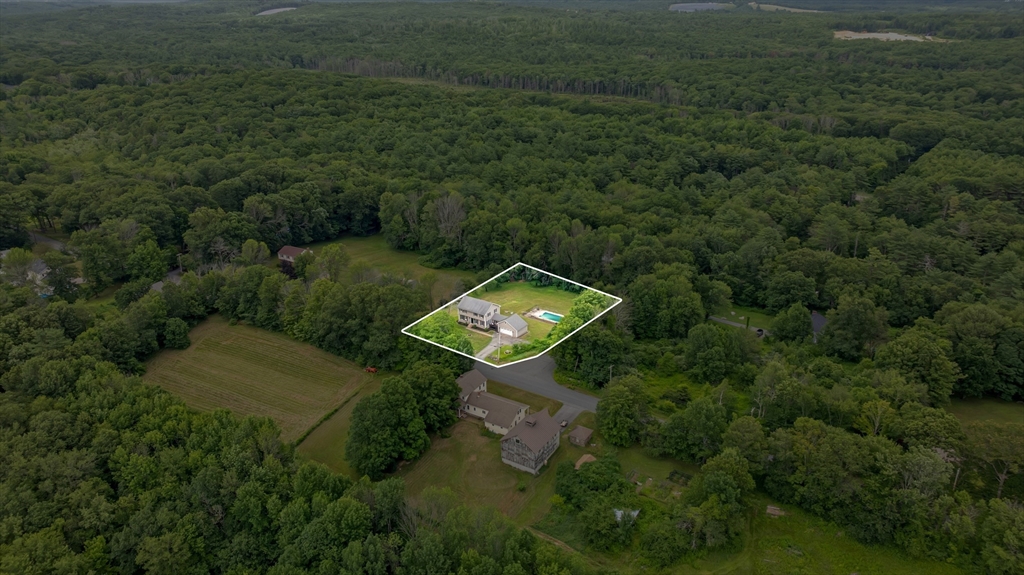 157 Podunk Road Sturbridge, MA 01566 - Photo 41 of 42 an aerial view of a house with a yard