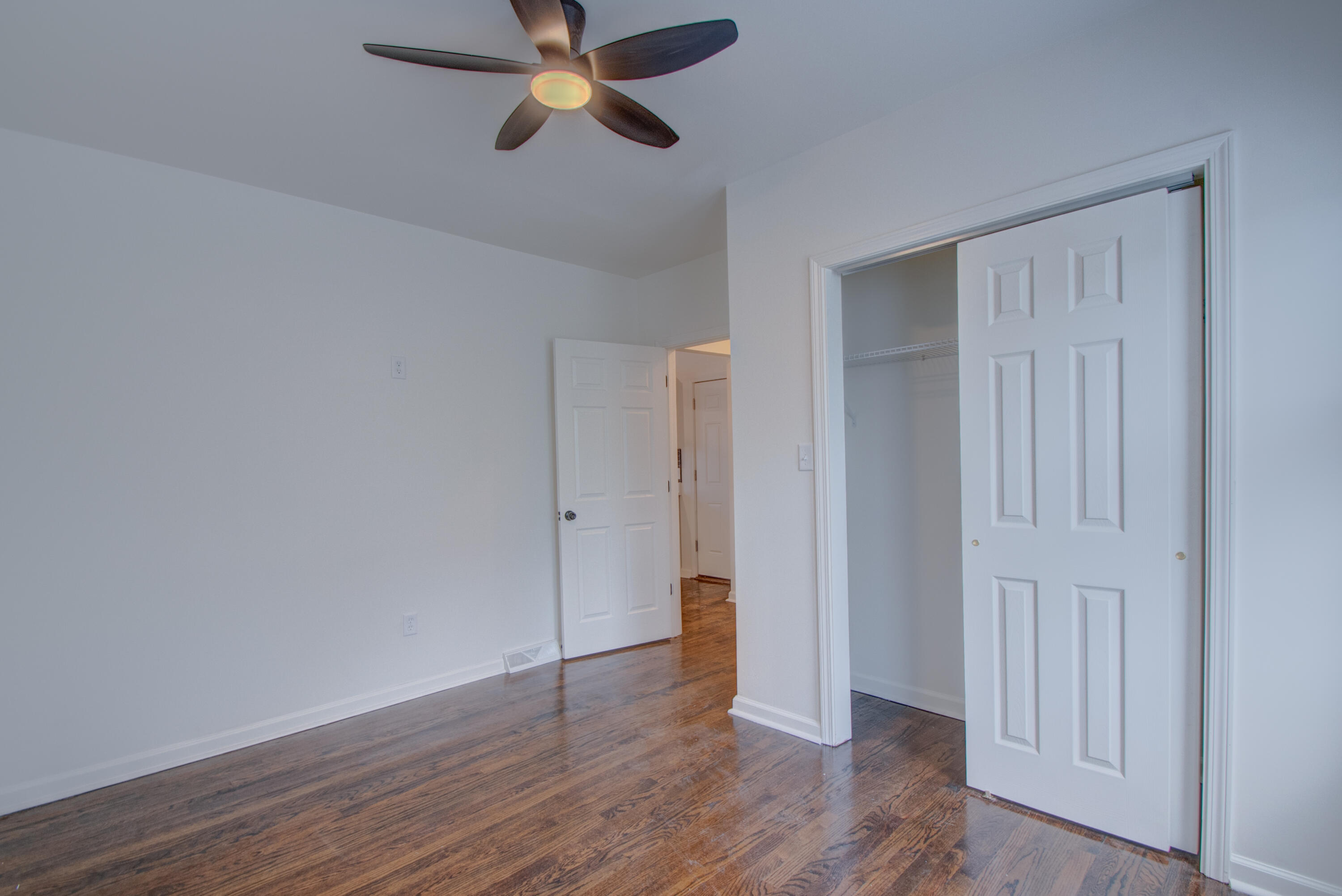 613 Tennessee Street Gary, IN 46402 - Photo 31 of 39 a view of an empty room with wooden floor
