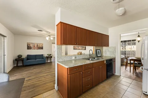 a kitchen with a sink and cabinets