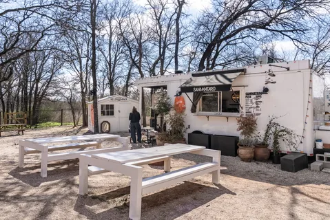 a view of a building with a patio