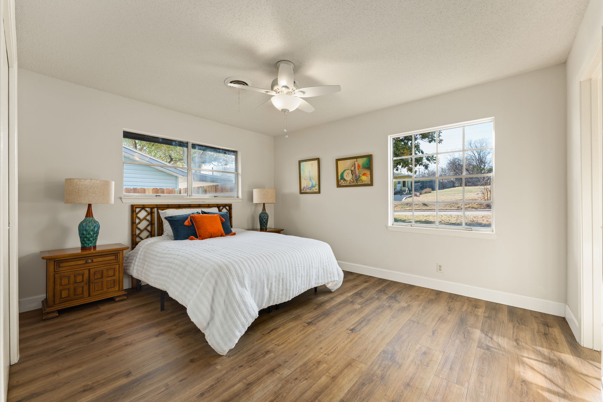 1903 Maple Avenue Austin, TX 78722 - Photo 6 of 39 The primary bedroom is spacious and has large windows offering tons of light.