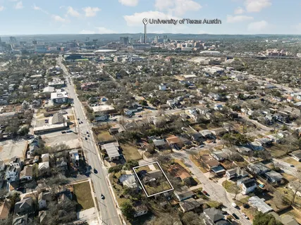 an aerial view of a city with lots of residential buildings