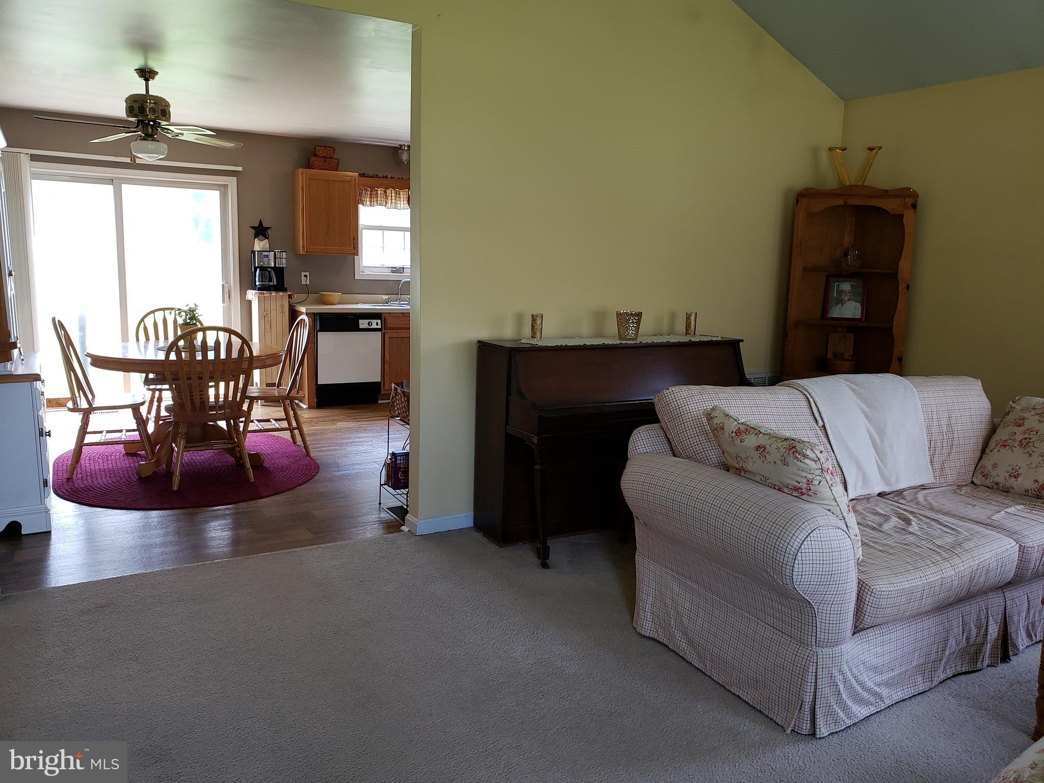 4 Oak Street Ridgely, MD 21660 - Photo 6 of 28 Living room with view into kitchen