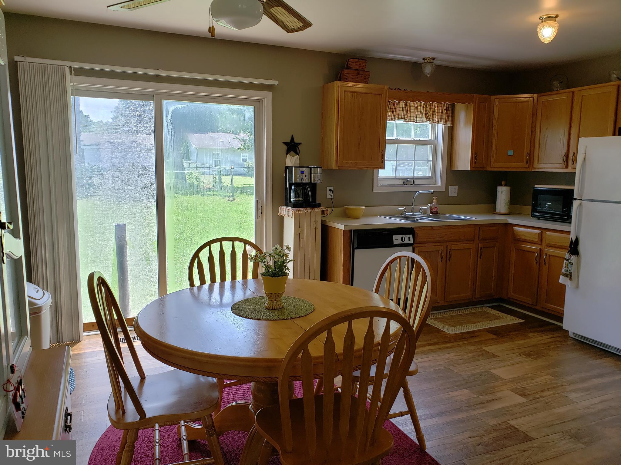 4 Oak Street Ridgely, MD 21660 - Photo 7 of 28 Dining area showing kitchen.