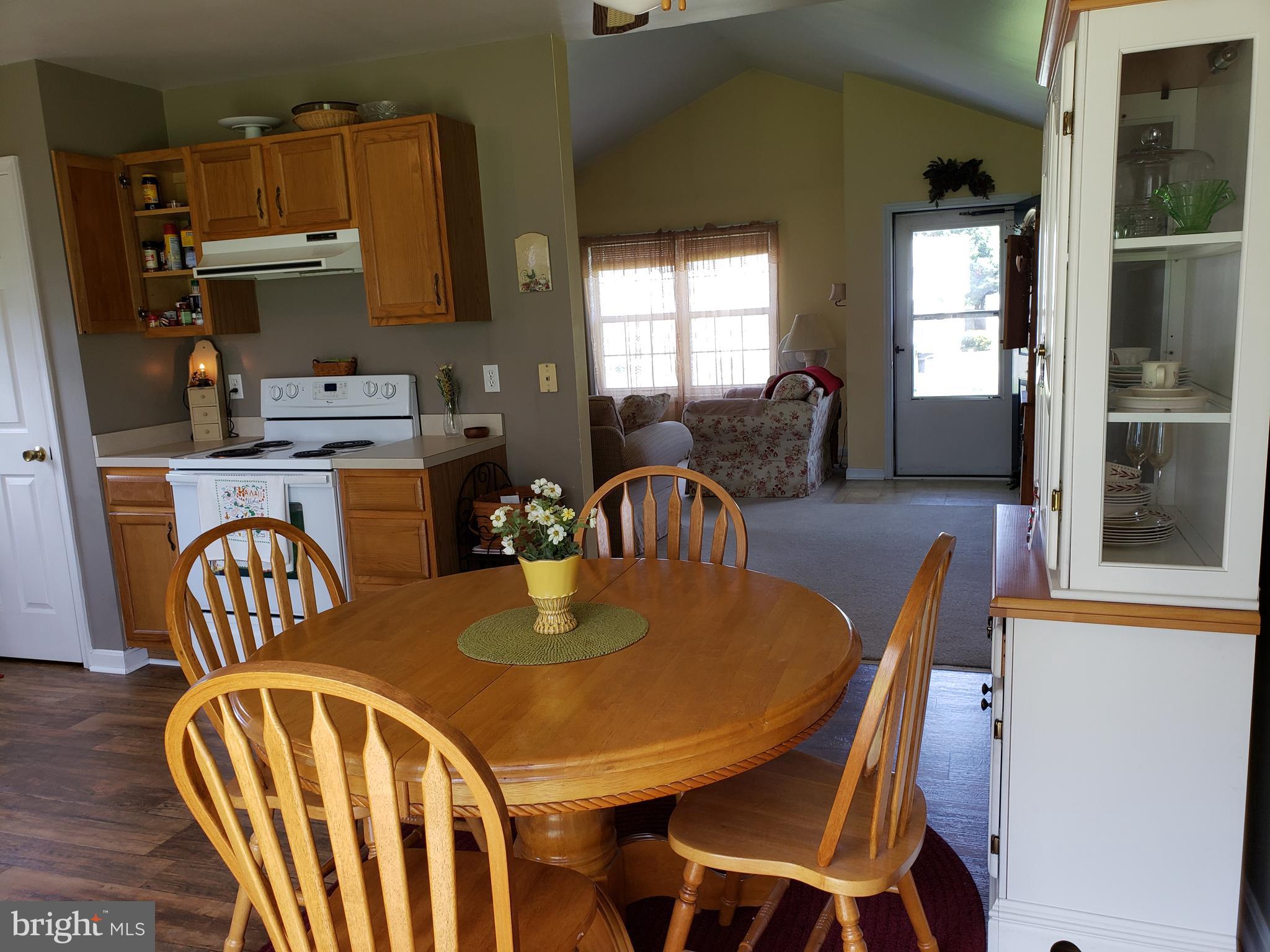 4 Oak Street Ridgely, MD 21660 - Photo 8 of 28 Dining area showing from slider to front door.