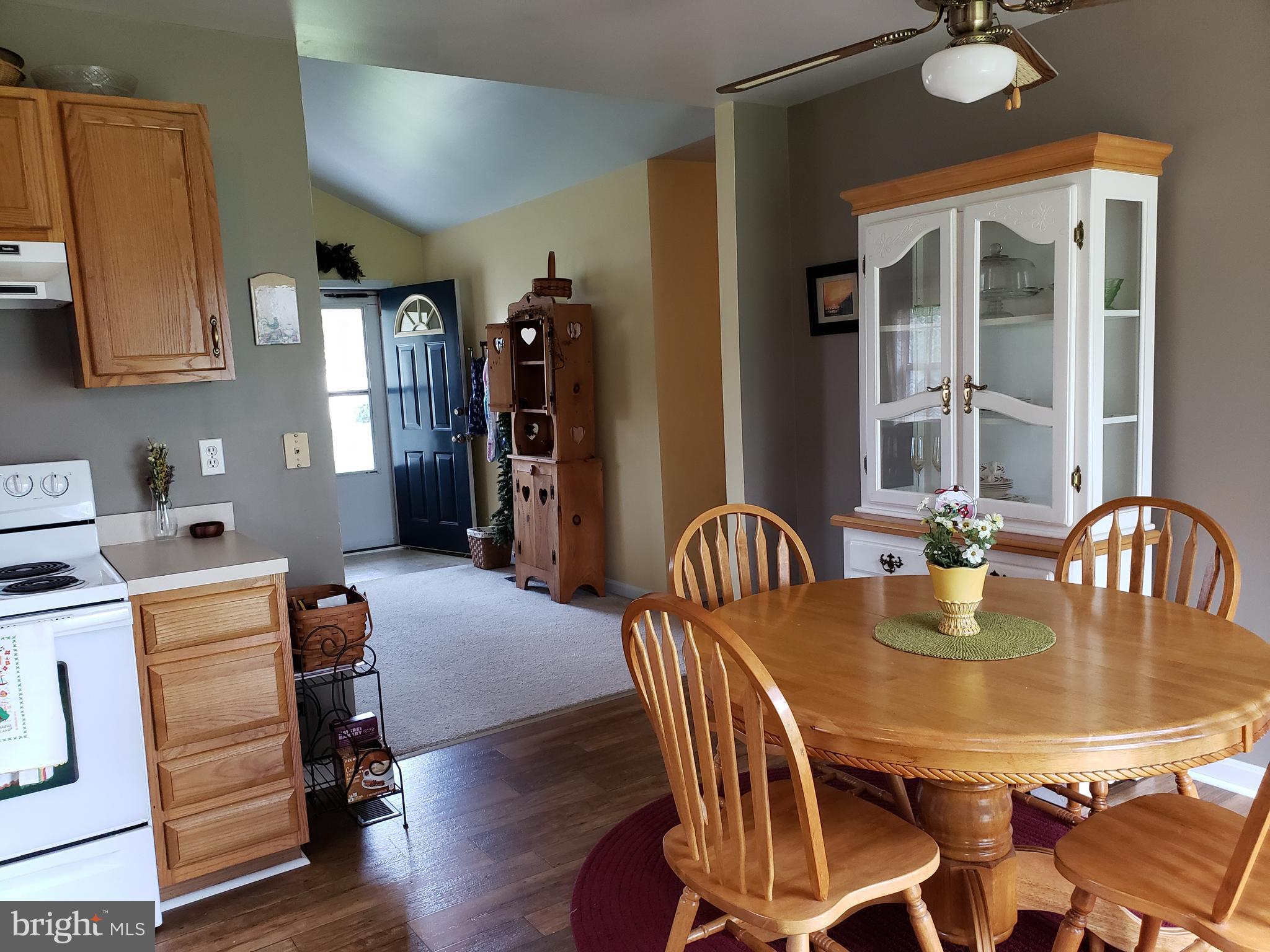 4 Oak Street Ridgely, MD 21660 - Photo 9 of 28 Dining area from kitchen showing front door.