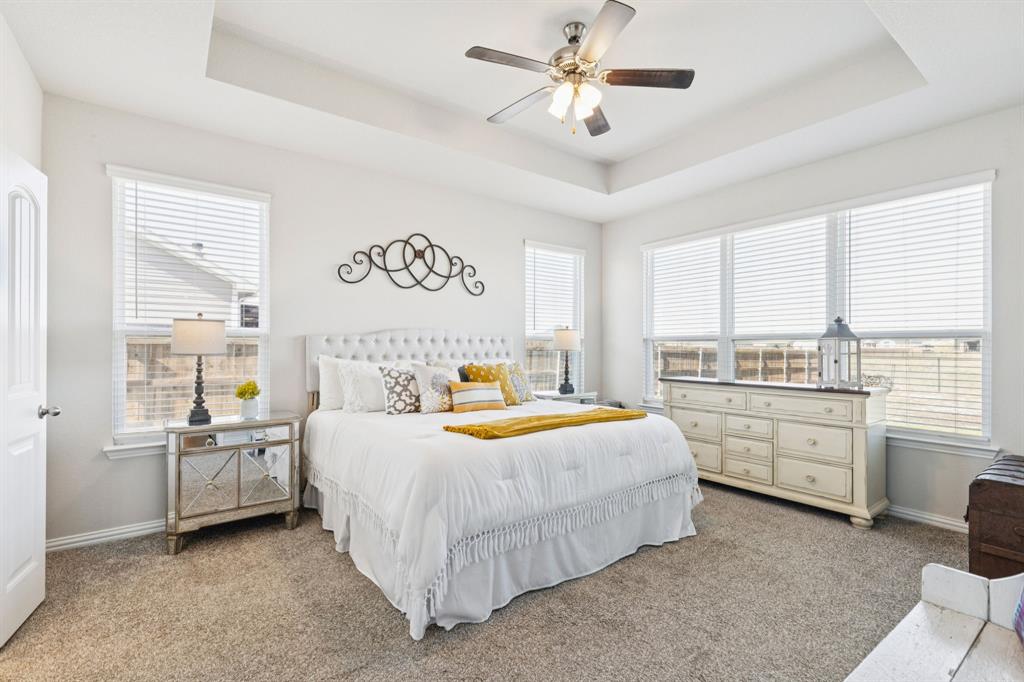 118 Mossy Creek Trail Rhome, TX 76078 - Photo 18 of 28 a bedroom with a bed and a large window with the outer view