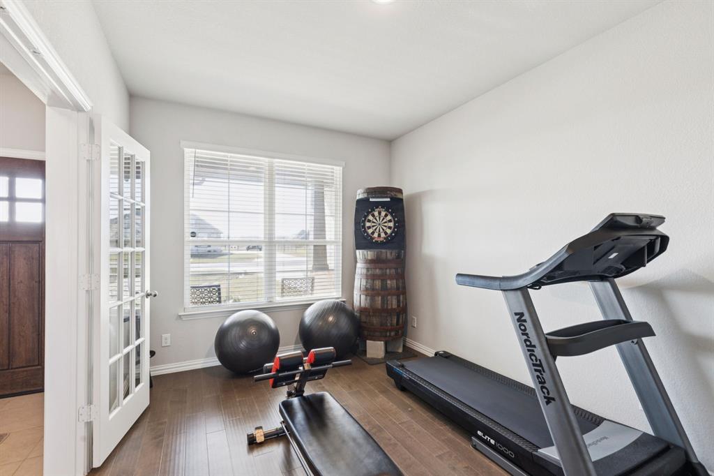 118 Mossy Creek Trail Rhome, TX 76078 - Photo 5 of 28 a view of a livingroom with furniture and windows