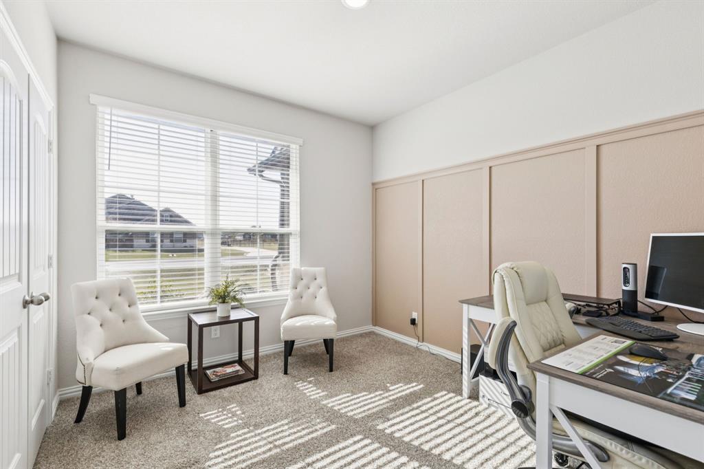 118 Mossy Creek Trail Rhome, TX 76078 - Photo 6 of 28 a work room with furniture and a window