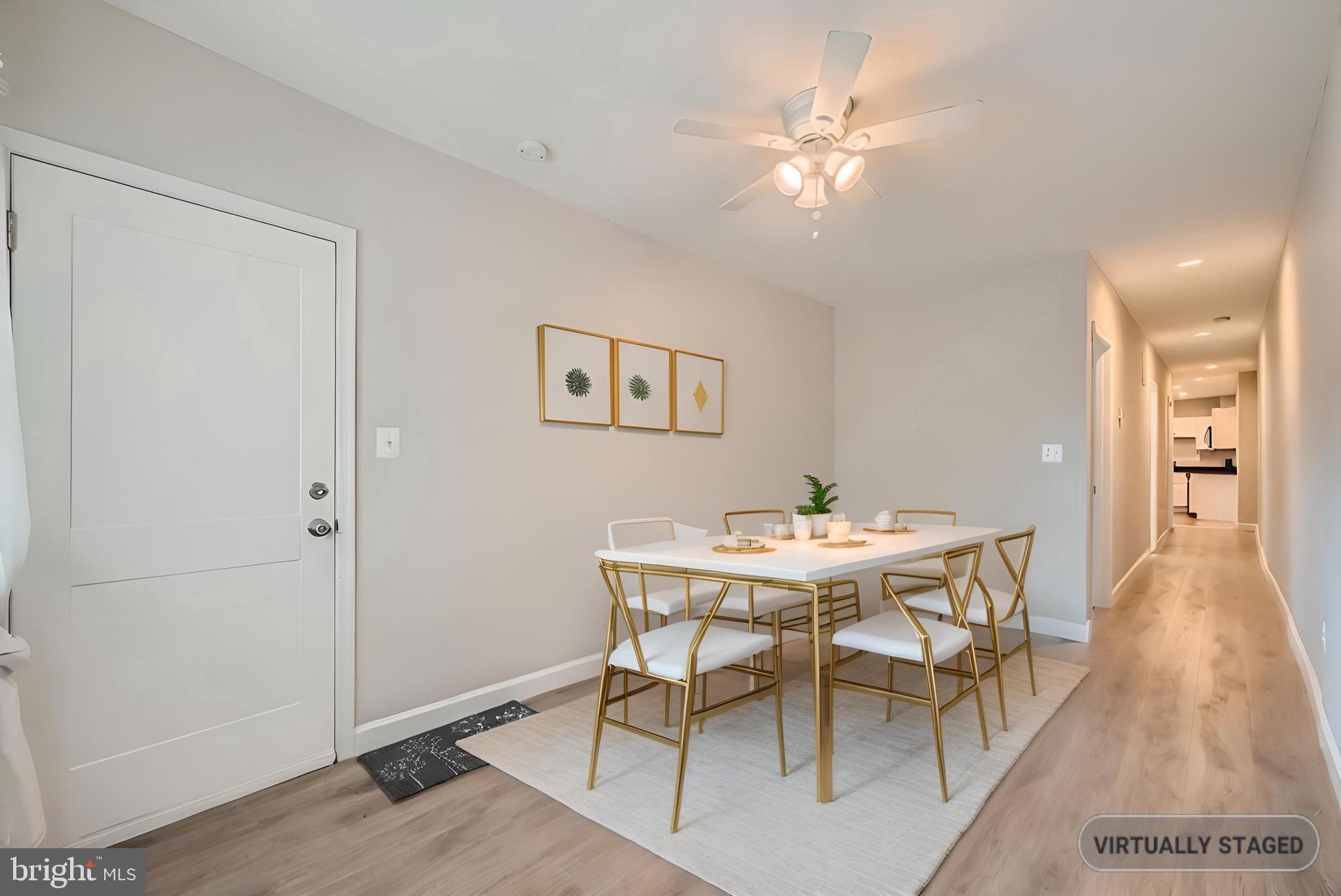2500 East Fayette Street, Unit 1 Baltimore, MD 21224 - Photo 6 of 17 Virtually Staged Dining/Living Area