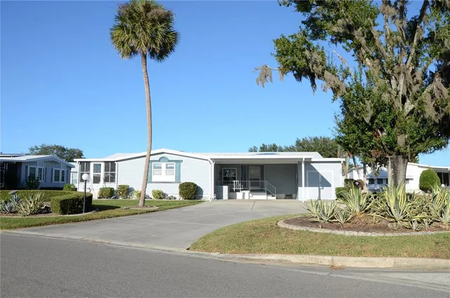 a view of a house with a swimming pool