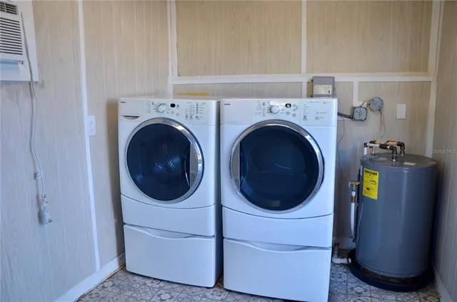 a utility room with dryer and washer