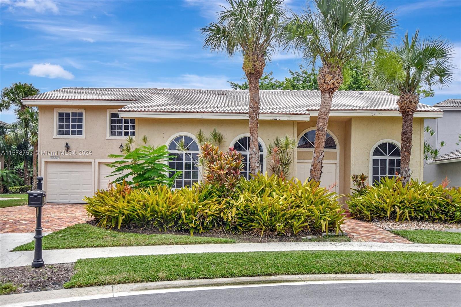20916 Avenel Run Boca Raton, FL 33428 - Photo 1 of 43 a front view of house with yard and green space