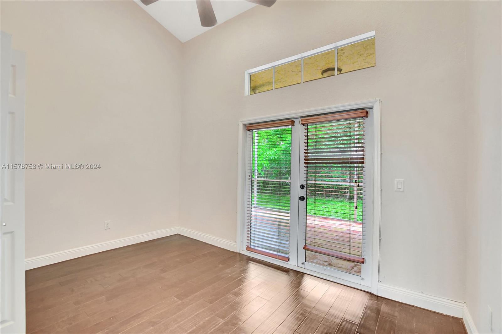 20916 Avenel Run Boca Raton, FL 33428 - Photo 18 of 43 a view of empty room with wooden floor and fan