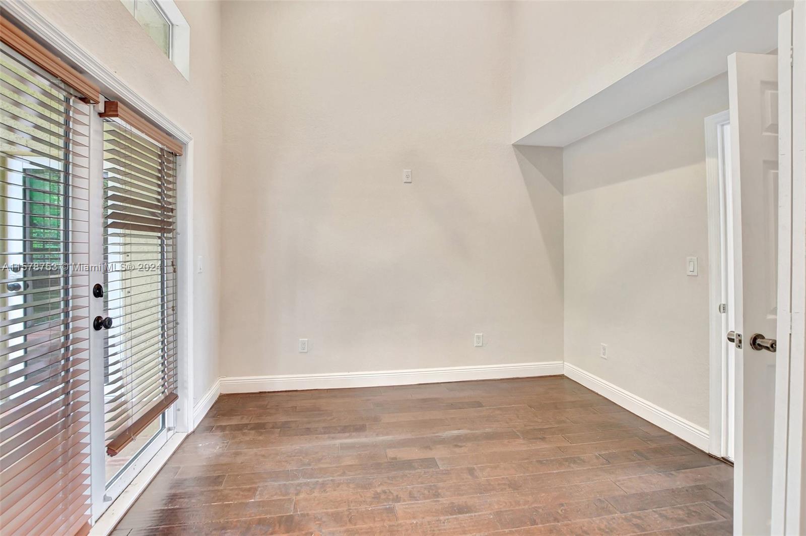 20916 Avenel Run Boca Raton, FL 33428 - Photo 19 of 43 a view of a small space with wooden floor and a window