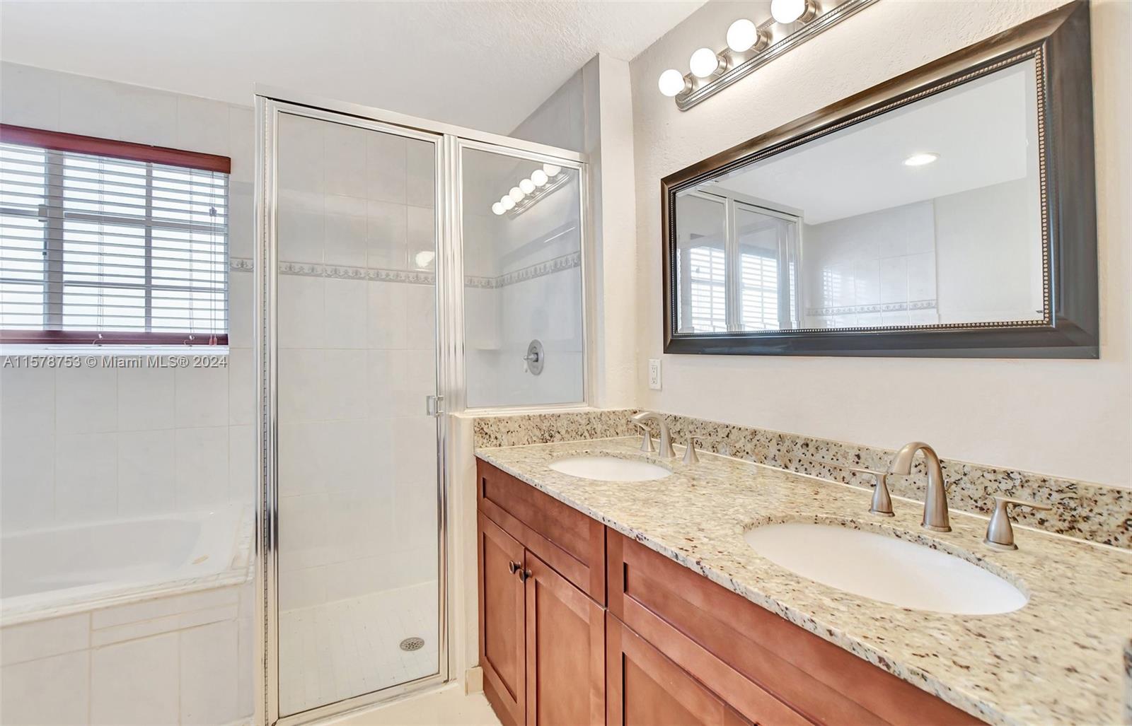 20916 Avenel Run Boca Raton, FL 33428 - Photo 26 of 43 a bathroom with a granite countertop sink mirror and double