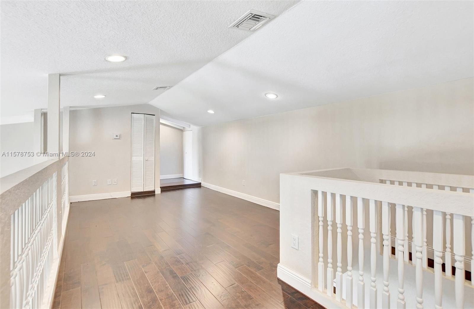 20916 Avenel Run Boca Raton, FL 33428 - Photo 29 of 43 a view of a livingroom with wooden floor