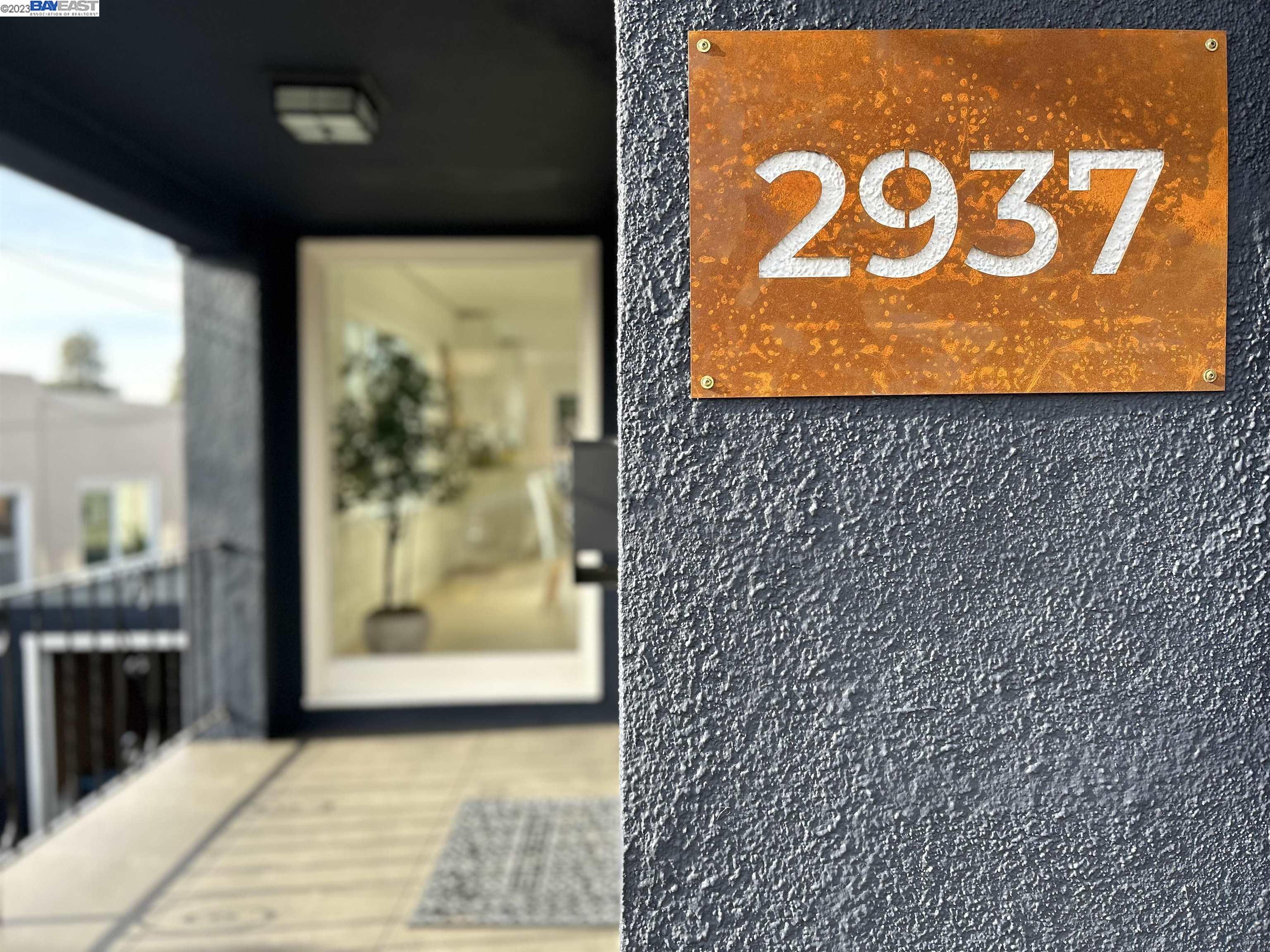 a sign board with a sign on the wall