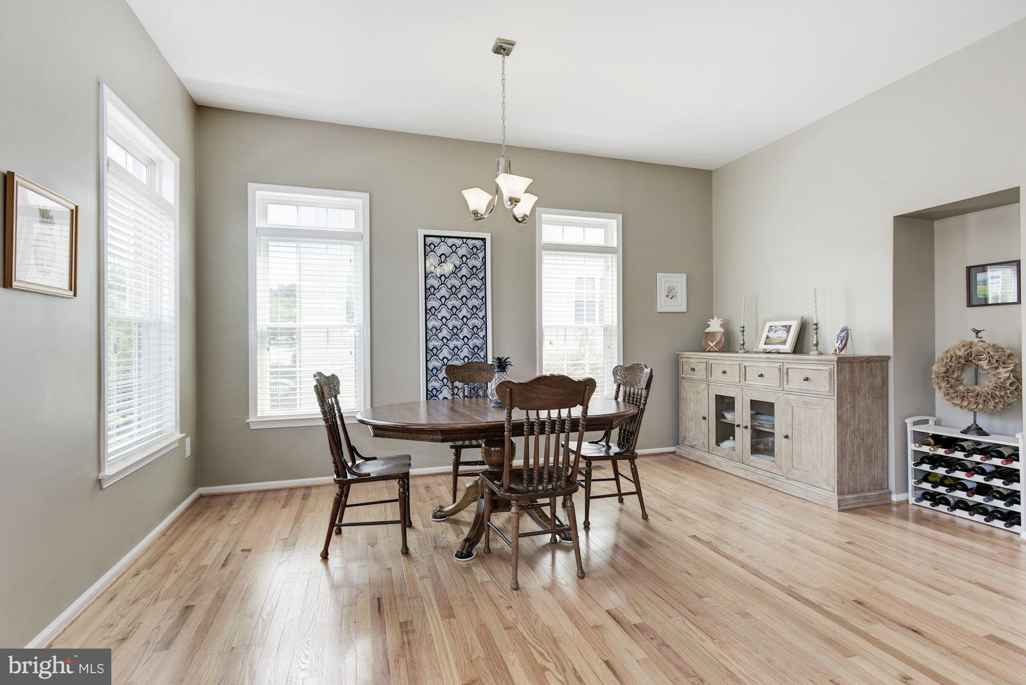 20709 Riptide Square Sterling, VA 20165 - Photo 11 of 30 a view of a dining room with furniture and window