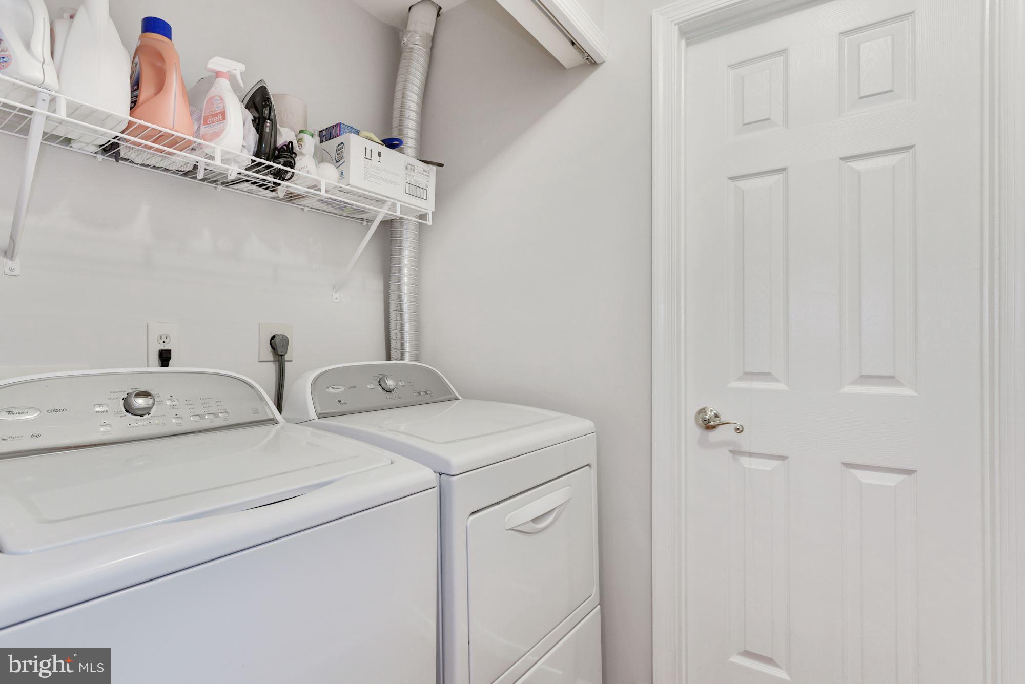 20709 Riptide Square Sterling, VA 20165 - Photo 28 of 30 a utility room with dryer and washer