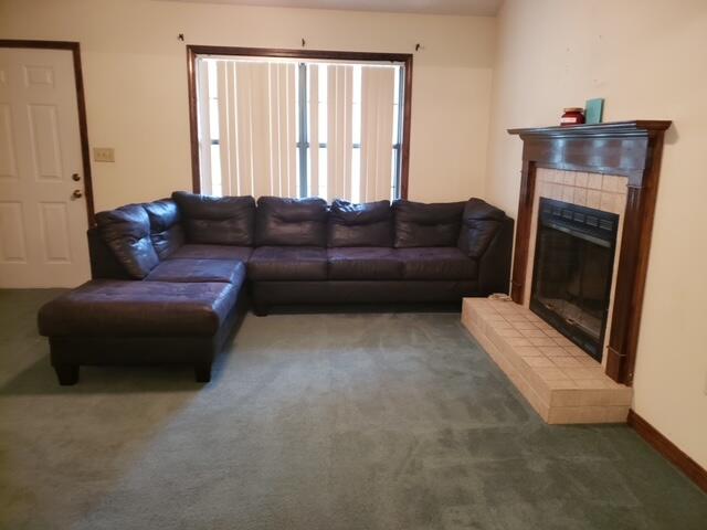 139 Beacons Bend Road Crestview, FL 32536 - Photo 5 of 5 a living room with furniture and a fireplace