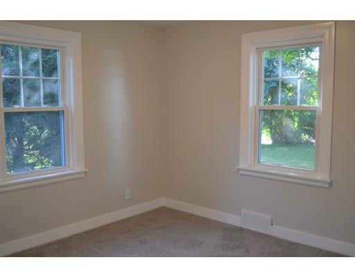 10 Highland Park Road Rutland, MA 01543 - Photo 14 of 21 an empty room with wooden floor and windows