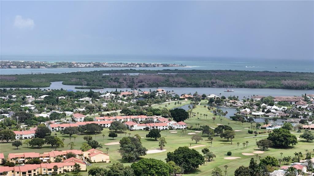 5313 Southeast Miles Grant Road, Unit 102 Stuart, FL 34997 - Photo 34 of 48 a view of a city