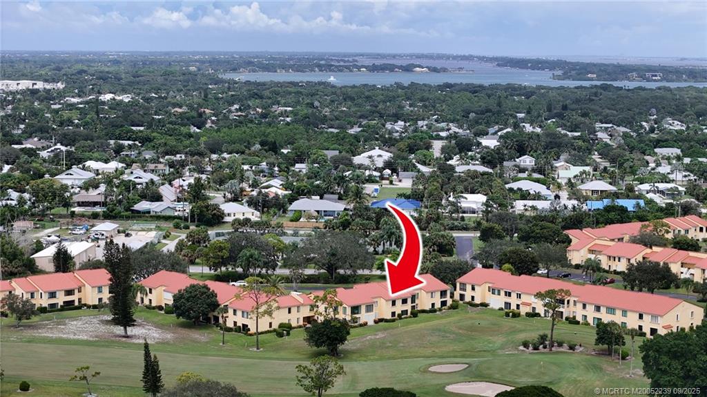 5313 Southeast Miles Grant Road, Unit 102 Stuart, FL 34997 - Photo 36 of 48 a view of a city