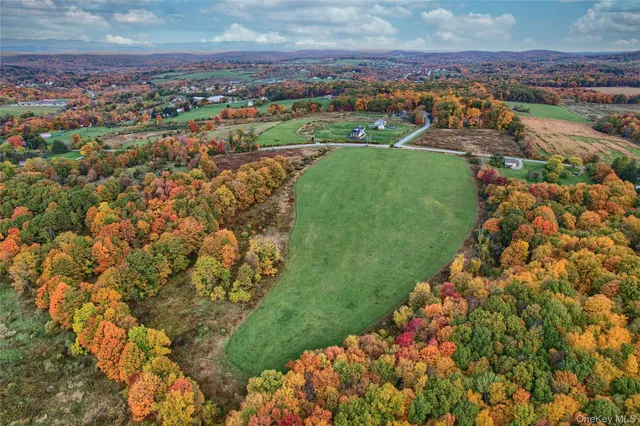 a view of a city with an ocean
