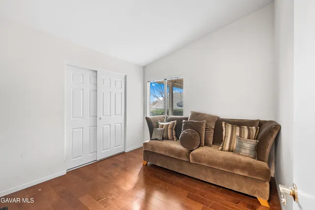 a living room with furniture and a couch