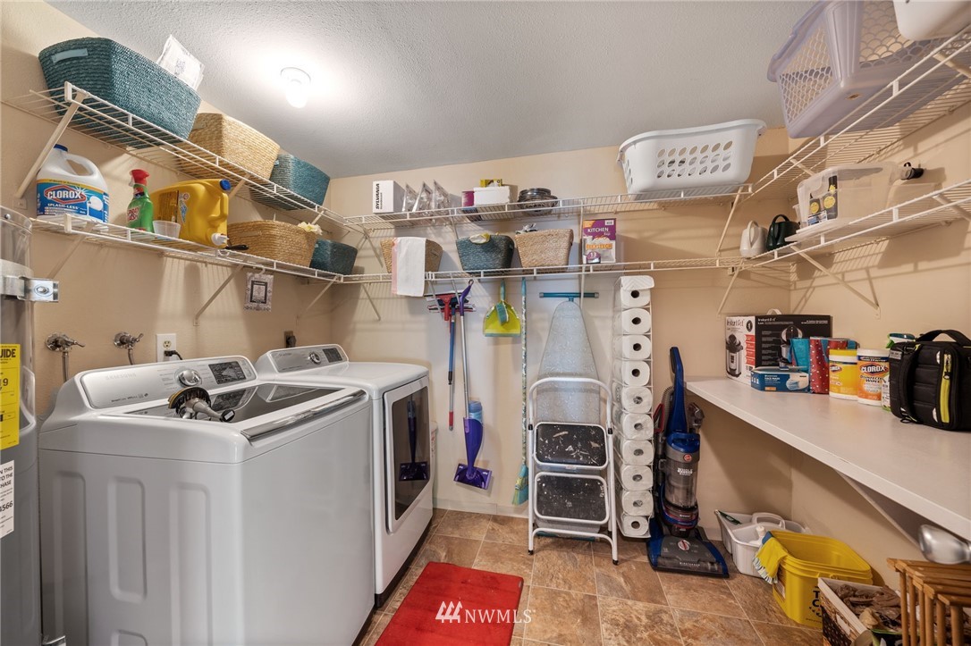 128 183rd Street Southwest Bothell, WA 98012 - Photo 18 of 33 a storage room with cabinets