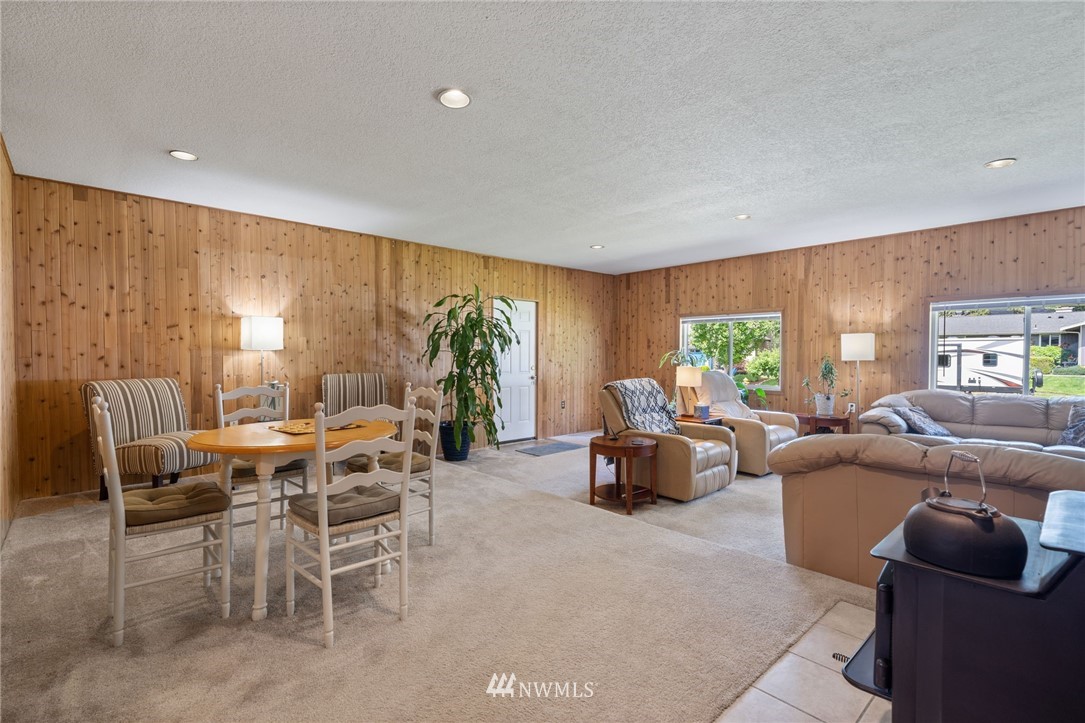 128 183rd Street Southwest Bothell, WA 98012 - Photo 20 of 33 a living room with furniture and a large window