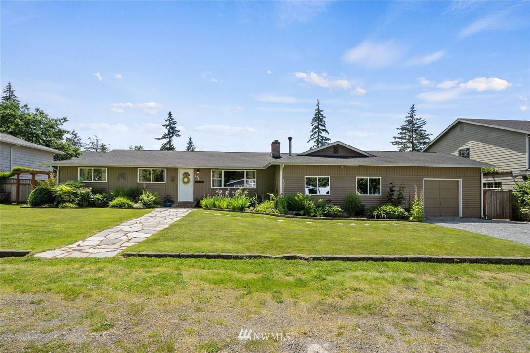 128 183rd Street Southwest Bothell, WA 98012 - Photo 3 of 33 a front view of a house with a yard