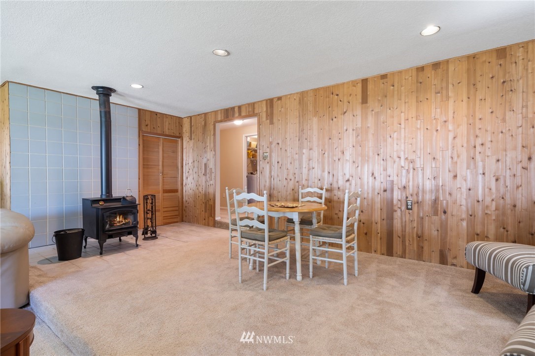 128 183rd Street Southwest Bothell, WA 98012 - Photo 21 of 33 a dining room with furniture and a chandelier